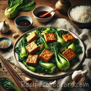 Crispy Tofu with Sautéed Greens served with bok choy, spinach, and sesame seeds in a rustic bowl.